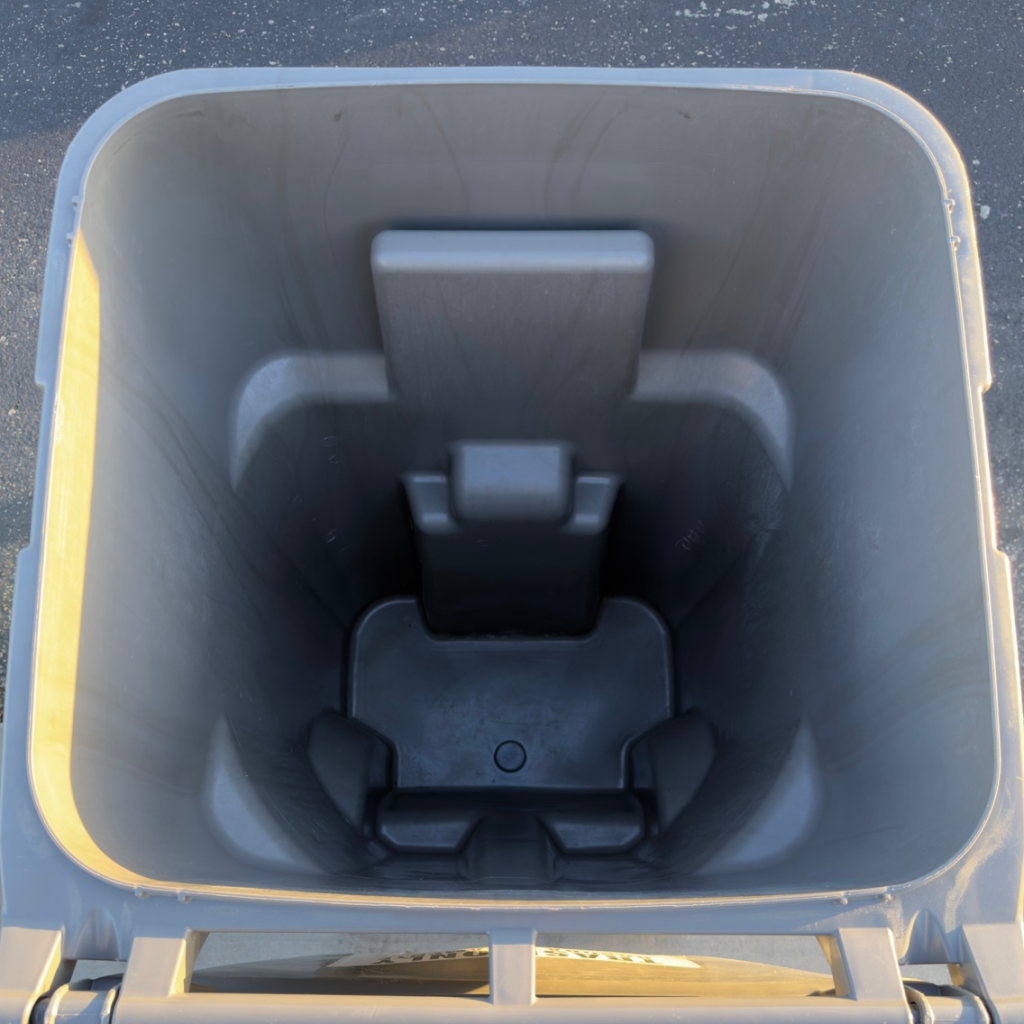 The same gray trash bin interior after a RinseRight wash